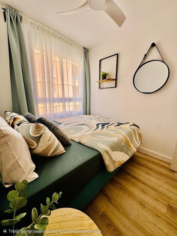 Habitación moderna con cocina abierta y aire acondicionado en Alicante — 5